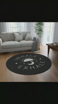 Load and play video in Gallery viewer, Inhale Exhale Round Rug — Black Meditation Yoga Rug with Sun &amp; Moon Design